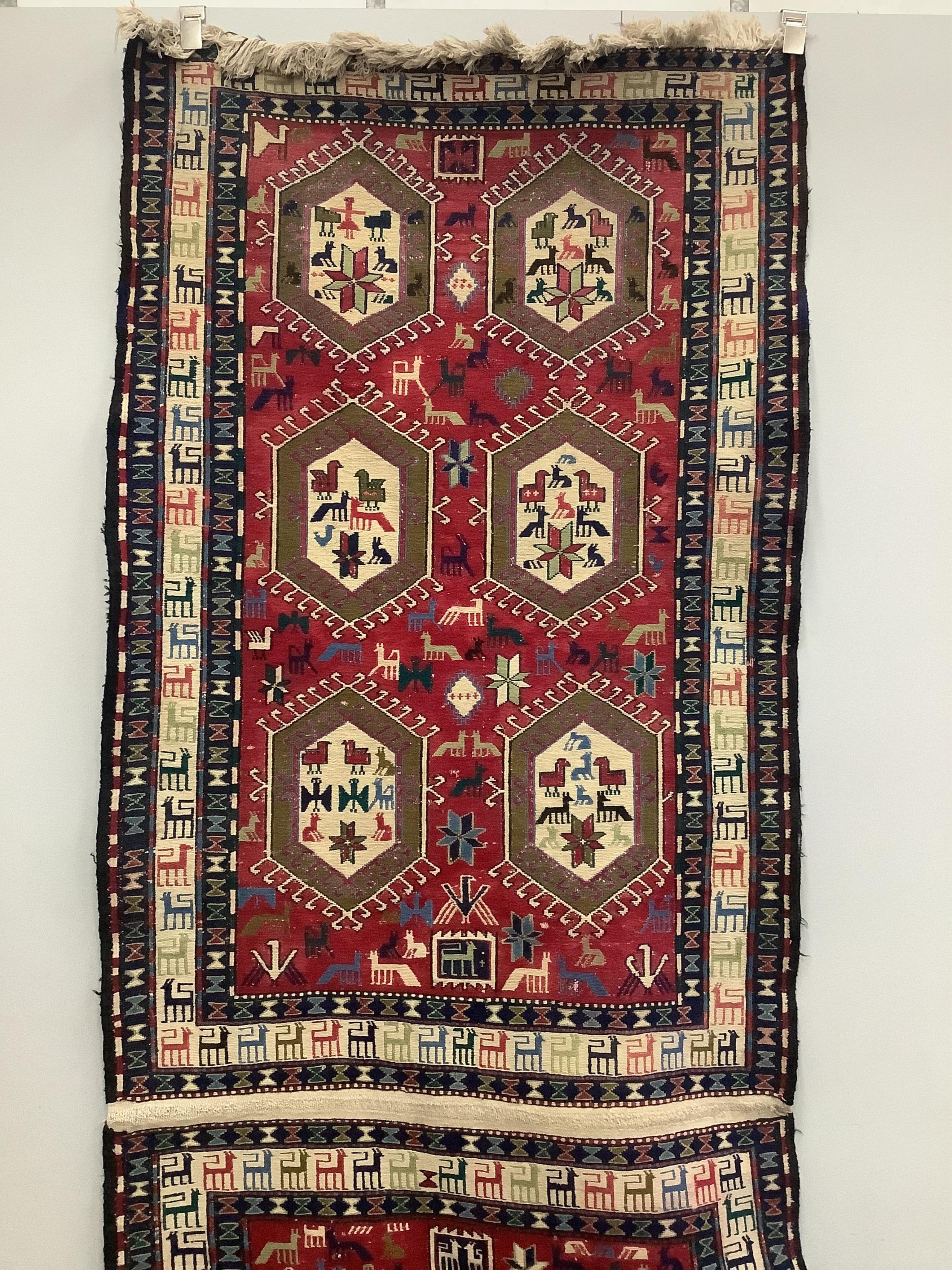 A Soumak flatweave rug, approximately 320 x 108cm. Condition - good